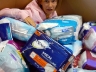 Becca disappearing in the mound of adult diapers... oh no.